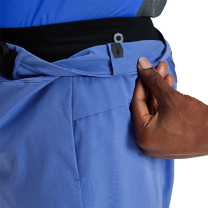 Man wearing the On Hybrid Shorts Colour Cobalt - Inside Lining 
