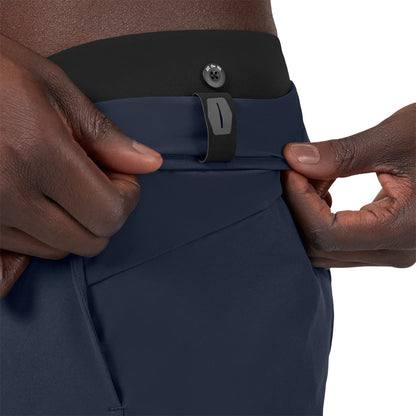 Man wearing the On Hybrid Shorts Colour Navy - Shorts Inner Lining  