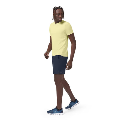 Man wearing the On Hybrid Shorts Colour Navy - Side Profile 