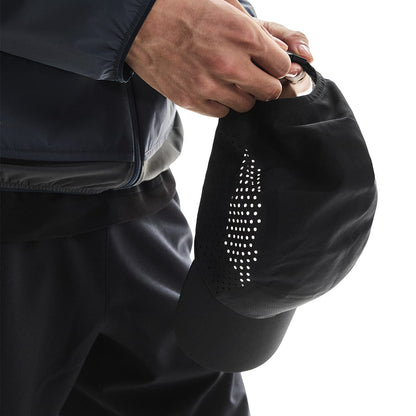 Close-up of detail and strap adjustment of the On Lightweight Cap in Black 