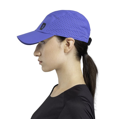 Female Model wearing the On Lightweight Cap Colour Cobalt - Side Profile 