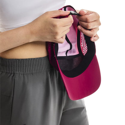 Close-up of interior detail and strap adjustment of the On Lightweight Cap in Grenadine 