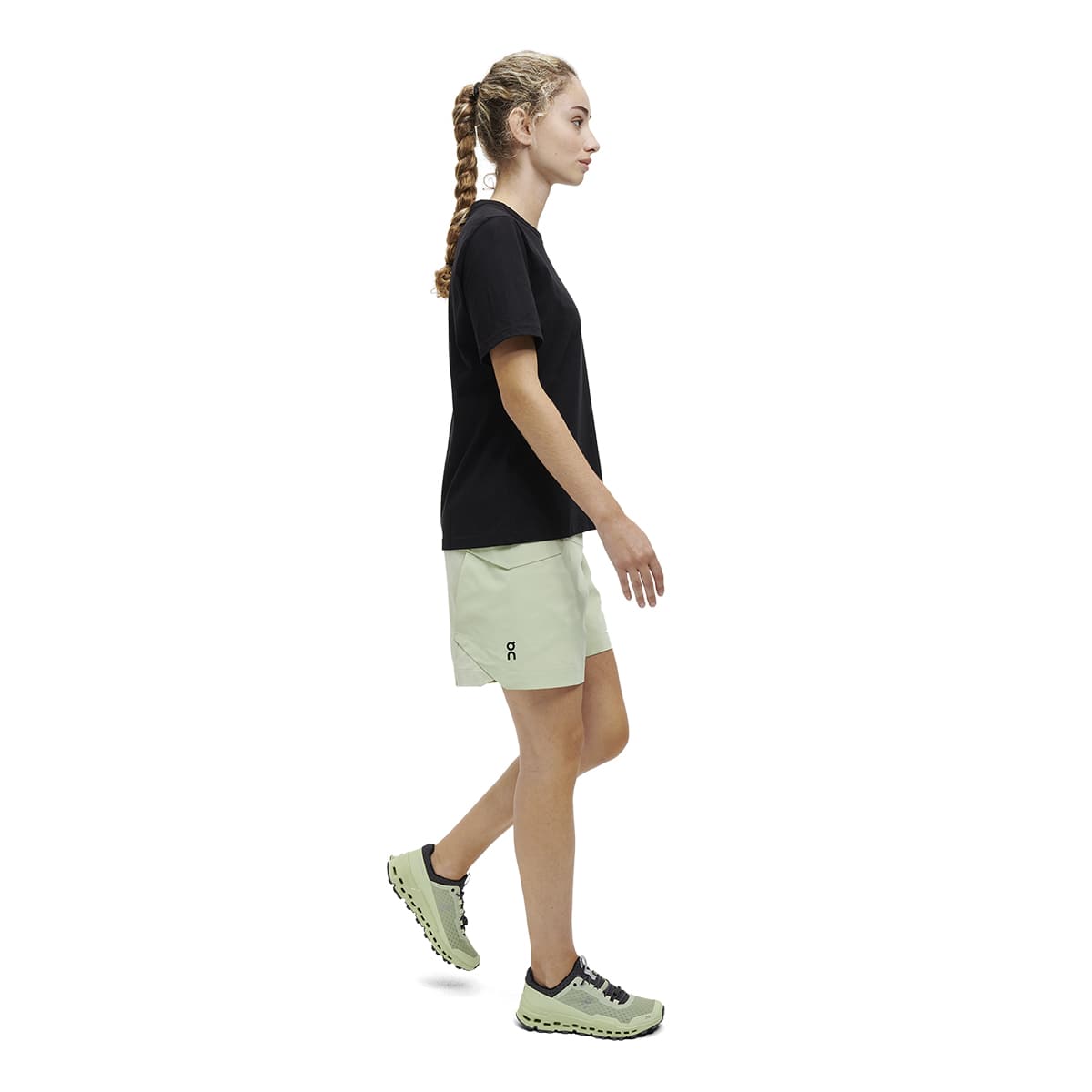 Woman wearing the On On T Colour Black - Side Angle #color_black