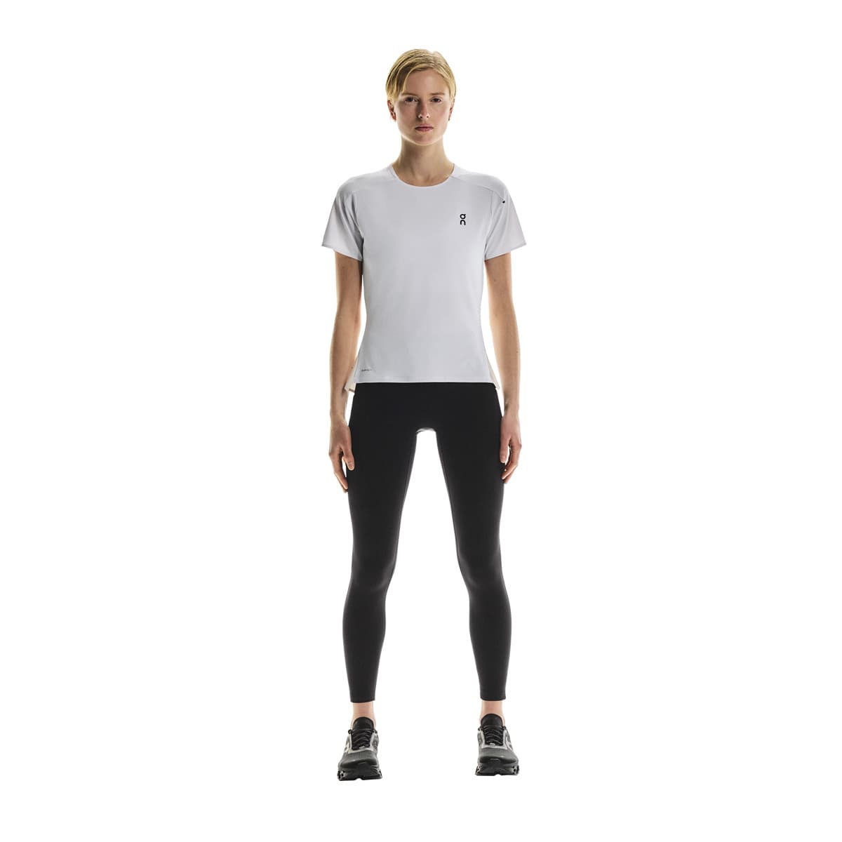 Full front view of female model wearing the On Performance T in White Silver 