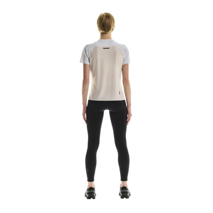 Full back view of female model wearing the On Performance T in White Silver 