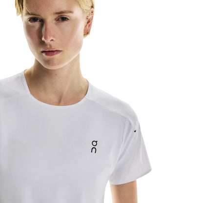 Front close-up of female model wearing the On Performance T in White Silver 