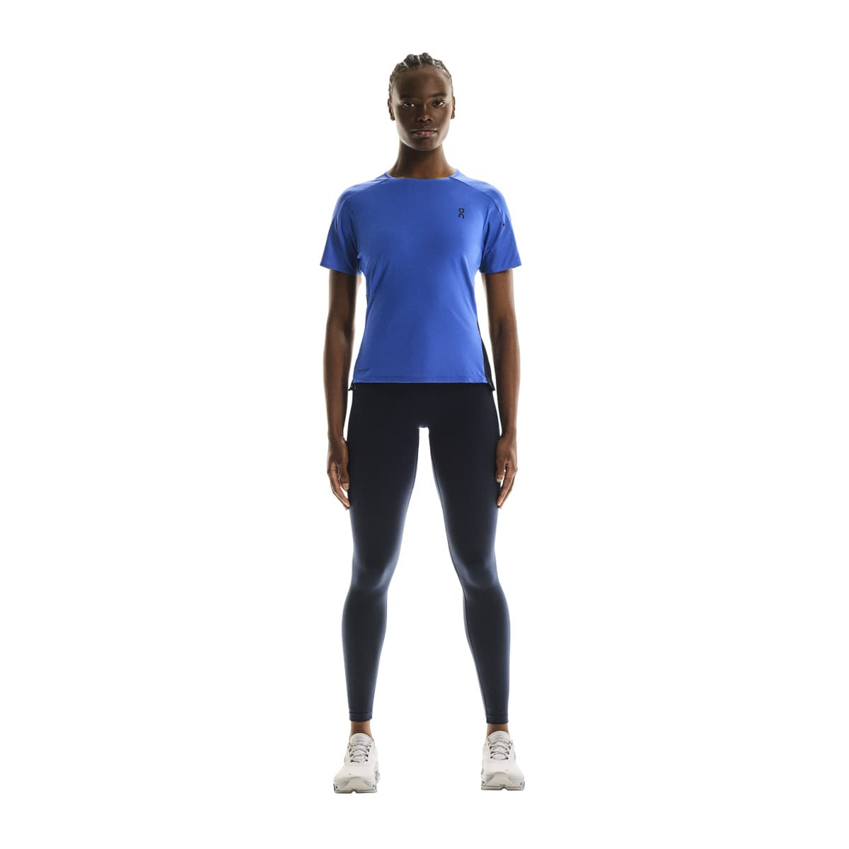 Full front view of female model wearing the On Performance T in Zaffre Navy 