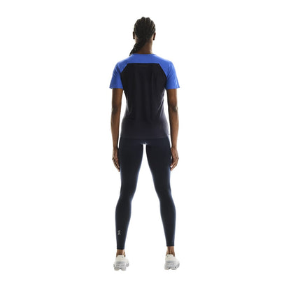 Full back view of female model wearing the On Performance T in Zaffre Navy 