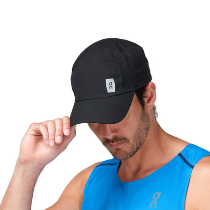 Male Model wearing the On Lightweight Cap Colour Black - Showing Detail 