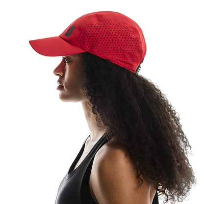 Female Model wearing the On Lightweight Cap Colour Red - Side Profile 
