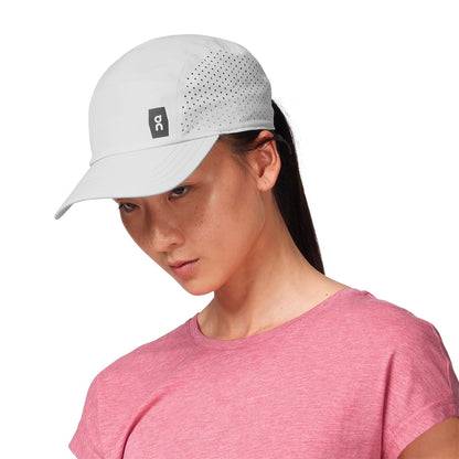 Female Model wearing the On Lightweight Cap Colour grey - Close up of Peak 