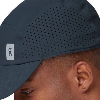 Male Model wearing the On Lightweight Cap Colour navy - Close up detail 
